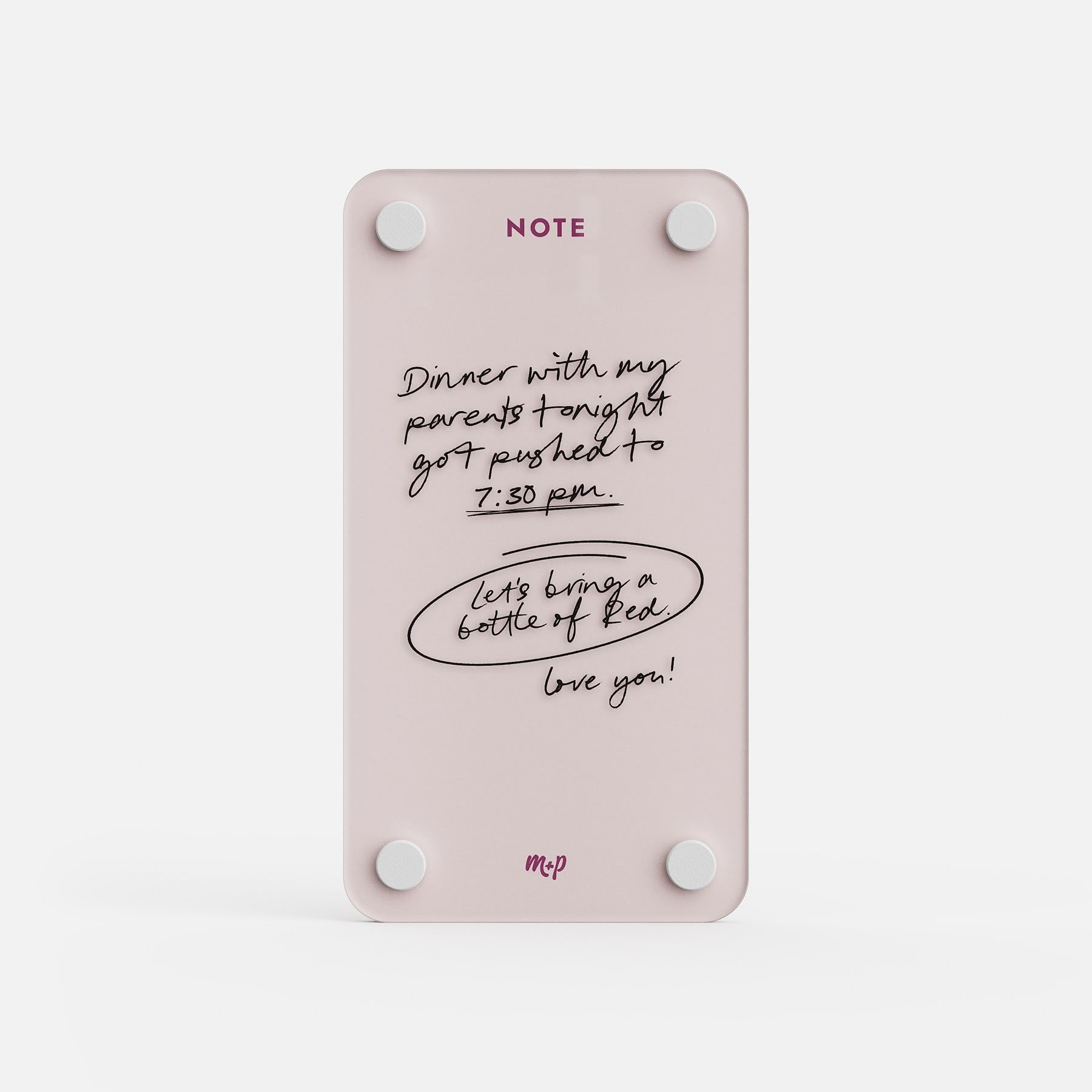 Linen white tall magnetic acrylic note board with a handwritten message about dinner moving to 7:30